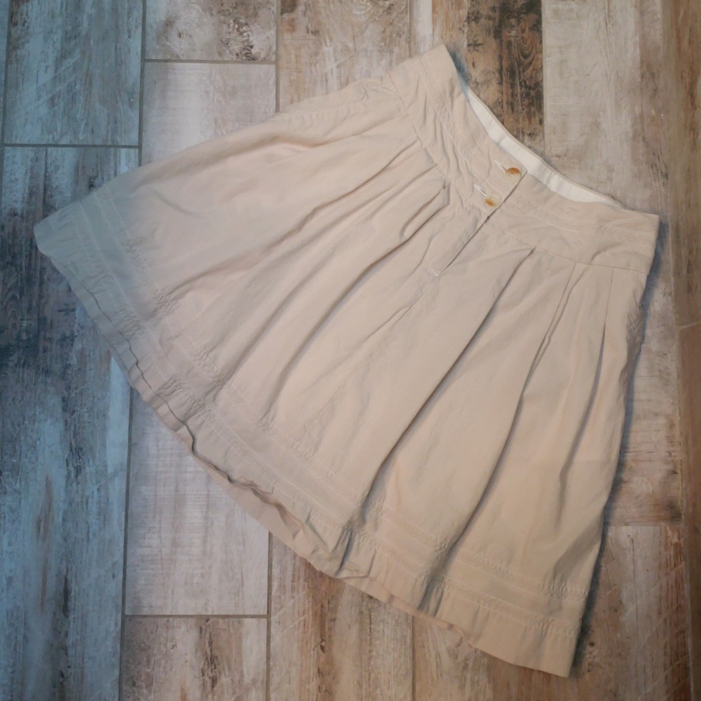 Cream a line skirt with pockets!